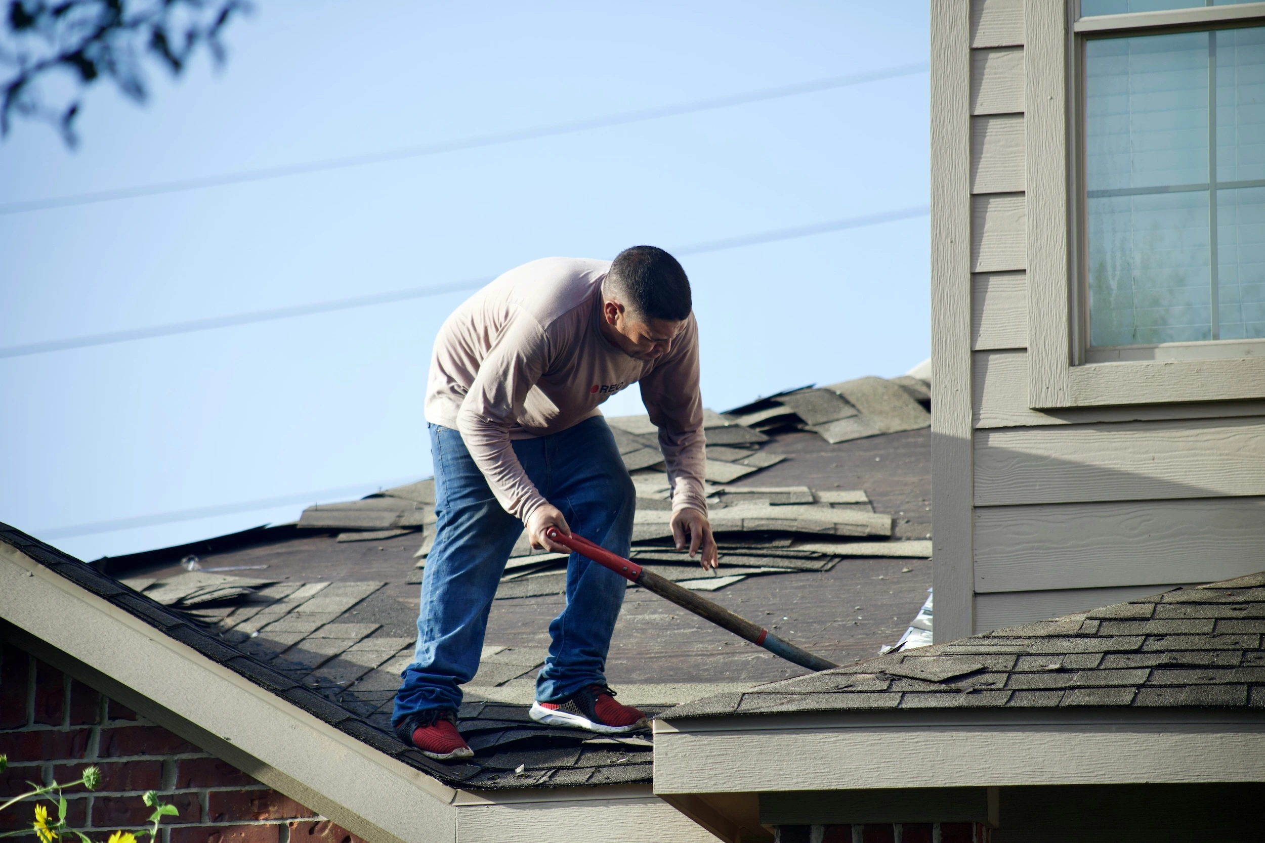 Home services technician reviewing a job on a mobile device